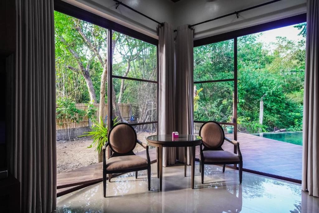 Posezení v ubytování CORON RIVERSIDE Guesthouse