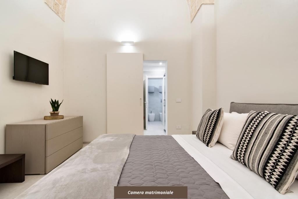 Postel nebo postele na pokoji v ubytování Chapeau Apartment - Lecce Selection