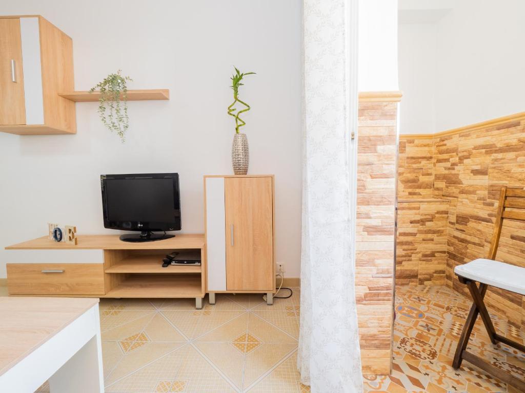 Telewizja i/lub zestaw kina domowego w obiekcie Cubo's Ideal Alhaurin Job