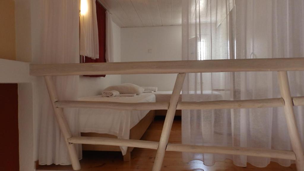 Postel nebo postele na pokoji v ubytování Mykonos Ornos RedOcher Home