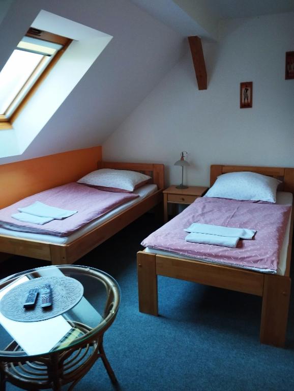 Postel nebo postele na pokoji v ubytování Ubytování Poustka
