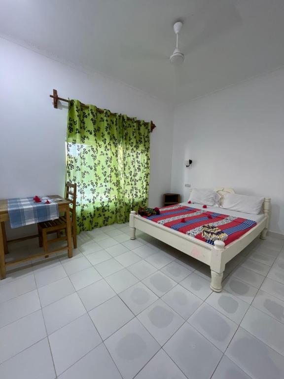 Postel nebo postele na pokoji v ubytování pole inn villa