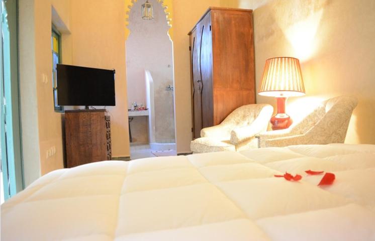 Postel nebo postele na pokoji v ubytování Riad el Medina