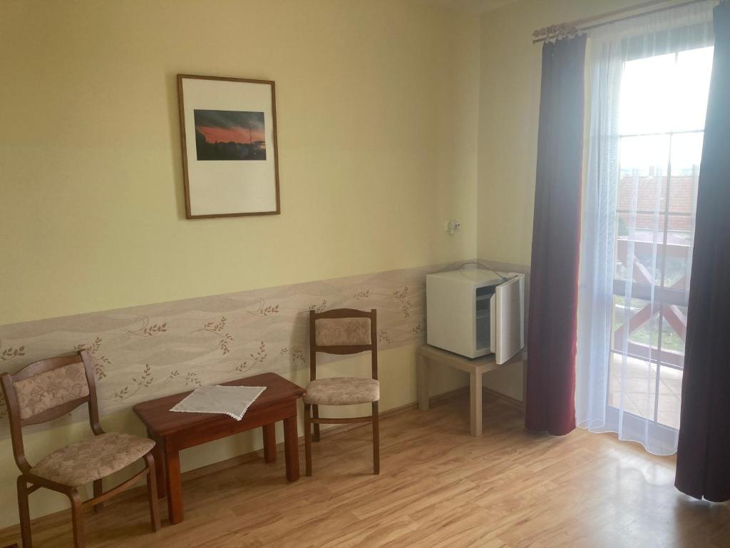 Posedenie v ubytovaní Bazilika Vendégház
