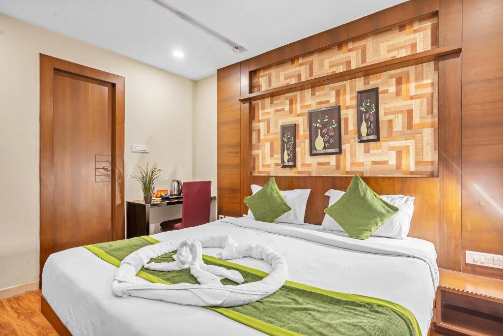 Postel nebo postele na pokoji v ubytování Hotel SM Deccan Park