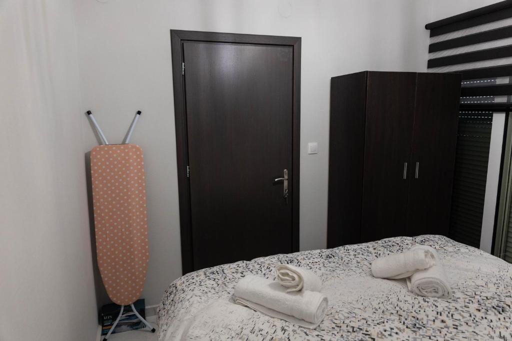 Postel nebo postele na pokoji v ubytování Comfortable Suites 2