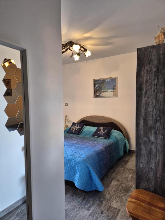 Postel nebo postele na pokoji v ubytování K-Rooms