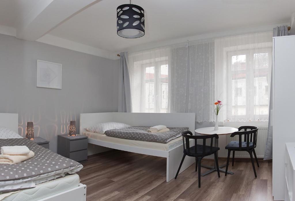 Postel nebo postele na pokoji v ubytování Hotel Richmond Teplice