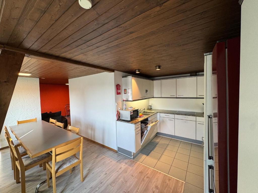 Kuchyň nebo kuchyňský kout v ubytování Downtown Apartments