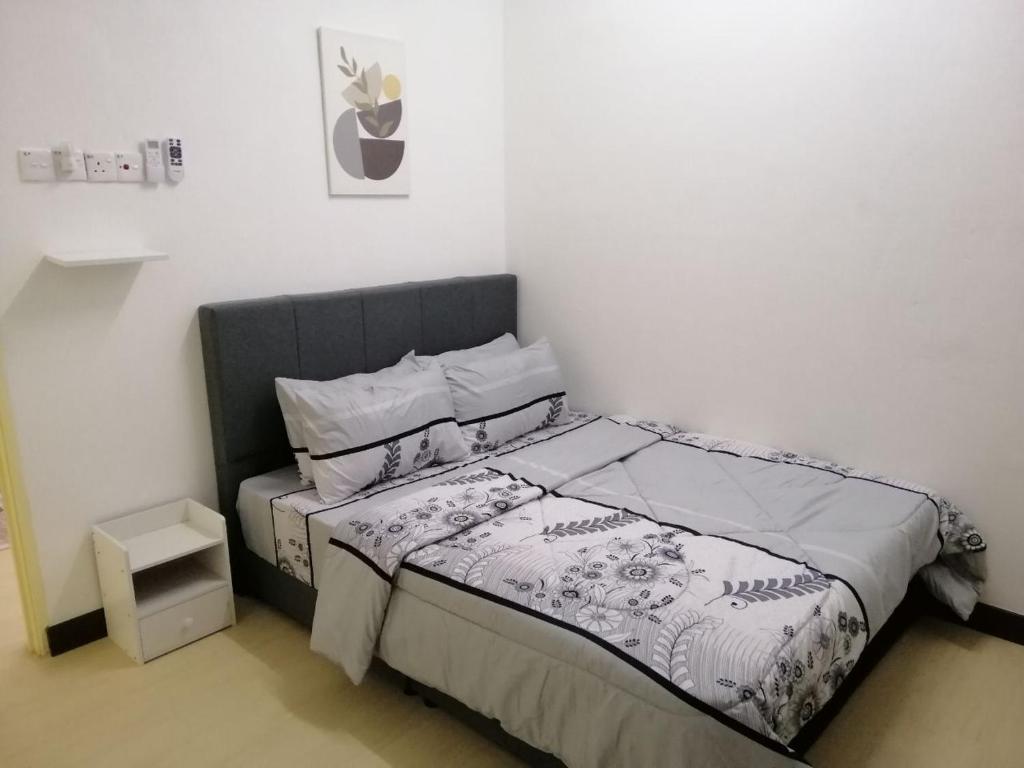 Postel nebo postele na pokoji v ubytování casa610 HOMESTAY PD