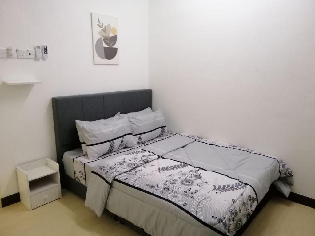 Postel nebo postele na pokoji v ubytování casa610 HOMESTAY PD