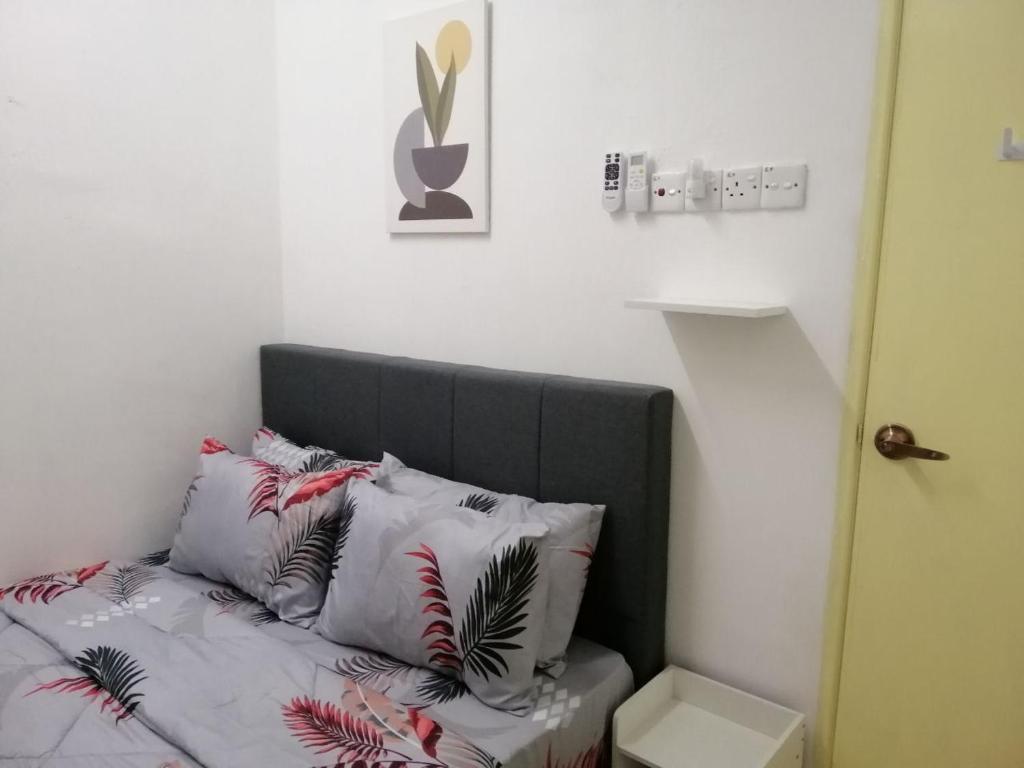 Postel nebo postele na pokoji v ubytování casa610 HOMESTAY PD
