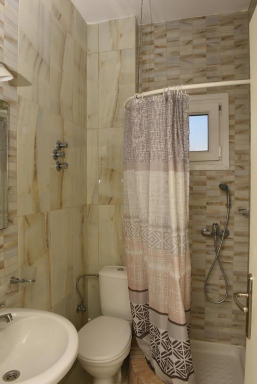 Koupelna v ubytování Star Beach Resort - Makrygialos Beachfront Nests