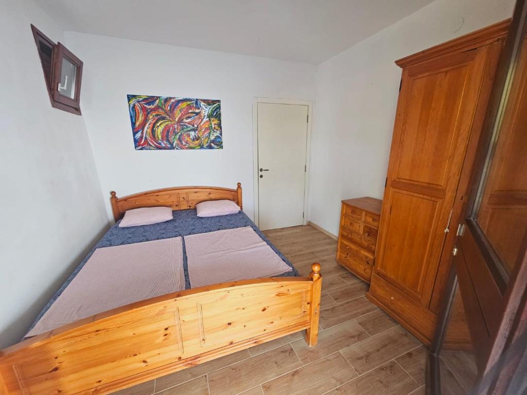 Posteľ alebo postele v izbe v ubytovaní Apartments Larisa