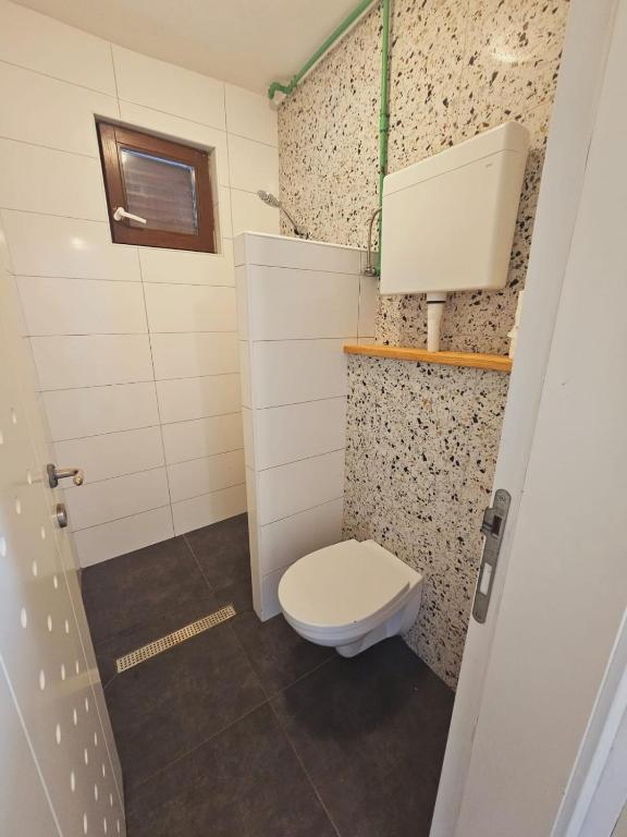 Kúpeľňa v ubytovaní Apartments Larisa