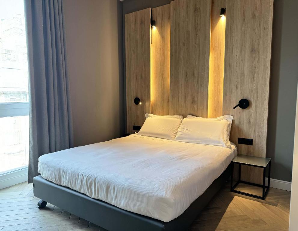 Postel nebo postele na pokoji v ubytování B&B Hotel Milano Aosta