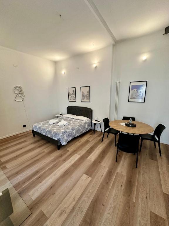Postel nebo postele na pokoji v ubytování Casa Mantova - vicino al Campus