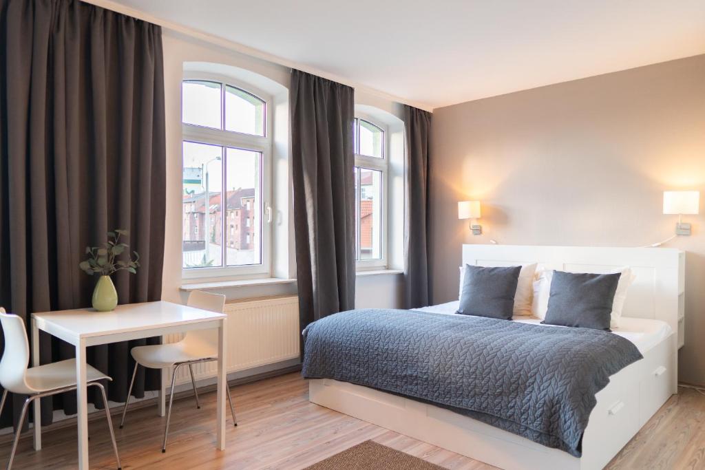 Postel nebo postele na pokoji v ubytování Apartment Hotel Lindeneck