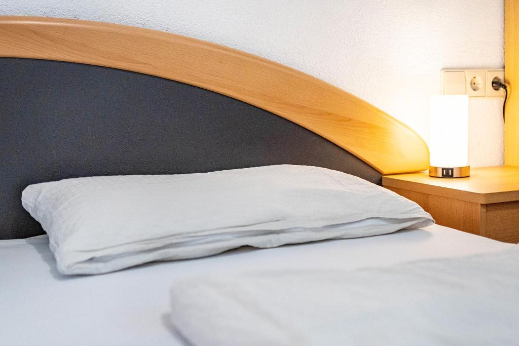 Postel nebo postele na pokoji v ubytování Fuchsmichelhof 2