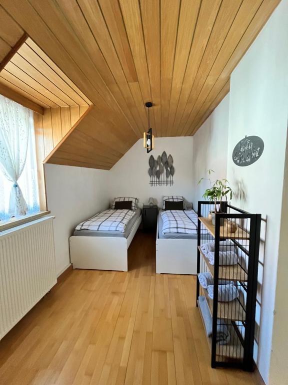 Posteľ alebo postele v izbe v ubytovaní Ferienhaus Silke
