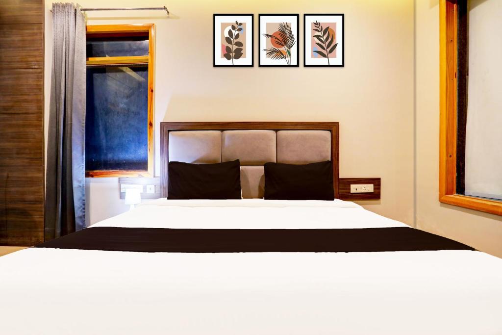 Postel nebo postele na pokoji v ubytování Super Collection O Alwar Formerly Hotel Ashoka
