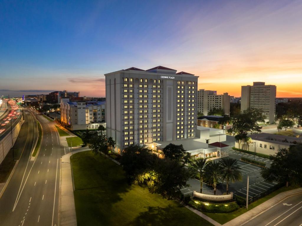 a city skyline with a tall building and a street at Crowne Plaza Orlando-Downtown by IHG in Orlando