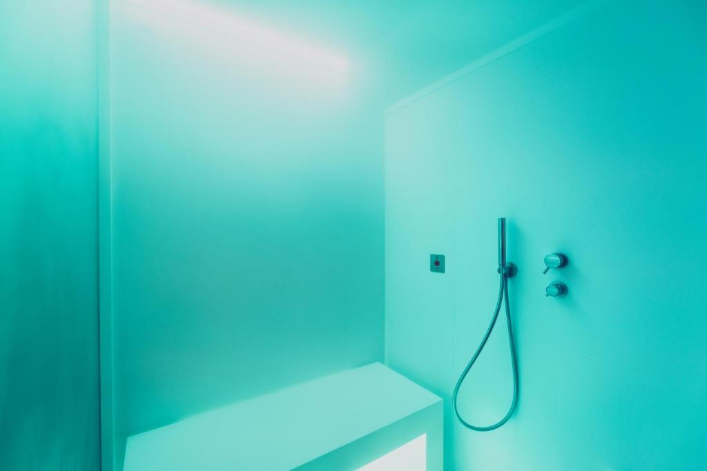 Koupelna v ubytování Sertorelli Sporthotel
