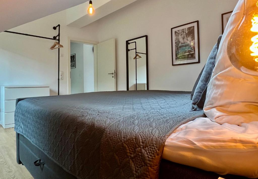 Postel nebo postele na pokoji v ubytování VonMos Panorama Apartments