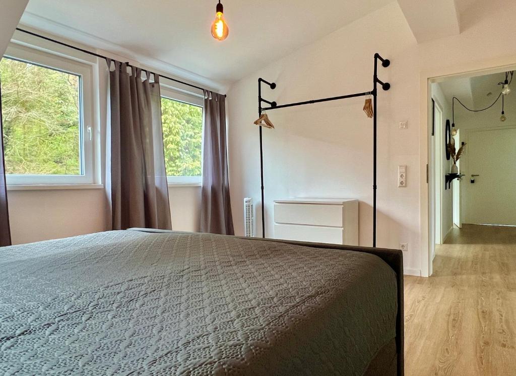 Postel nebo postele na pokoji v ubytování VonMos Panorama Apartments