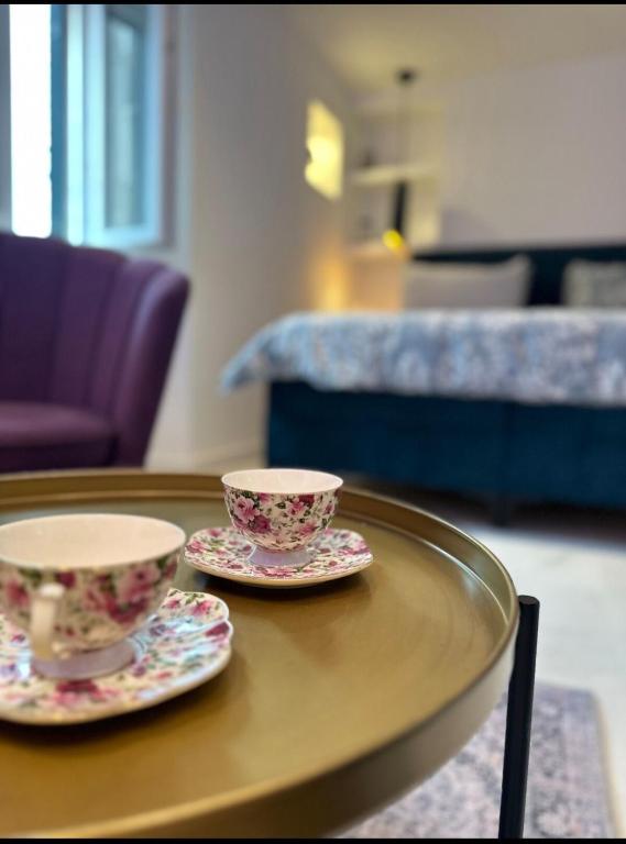 Postel nebo postele na pokoji v ubytování Madonna luxury rooms