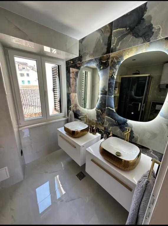 Koupelna v ubytování Madonna luxury rooms