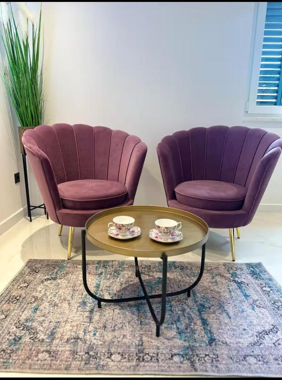 Posezení v ubytování Madonna luxury rooms