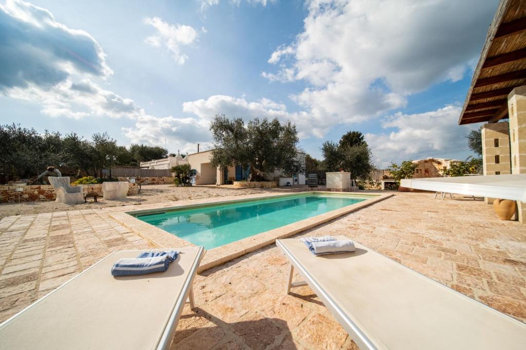Bazén v ubytovaní IL Trullo Di Mamma Lucia-Luxury Villa alebo v jeho blízkosti