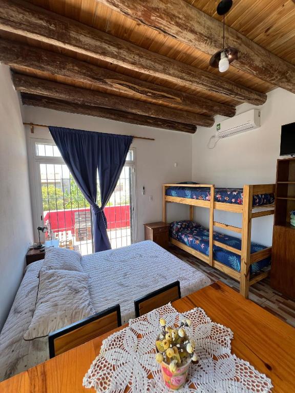 Postel nebo postele na pokoji v ubytování Monoambiente lo de Carola Mendoza
