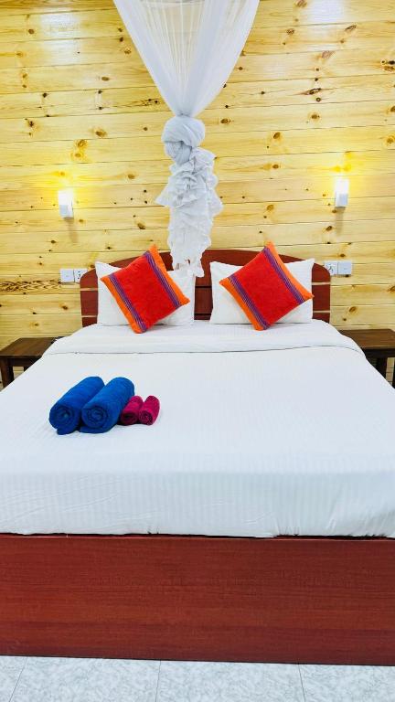 Postel nebo postele na pokoji v ubytování Will Guest Homestay
