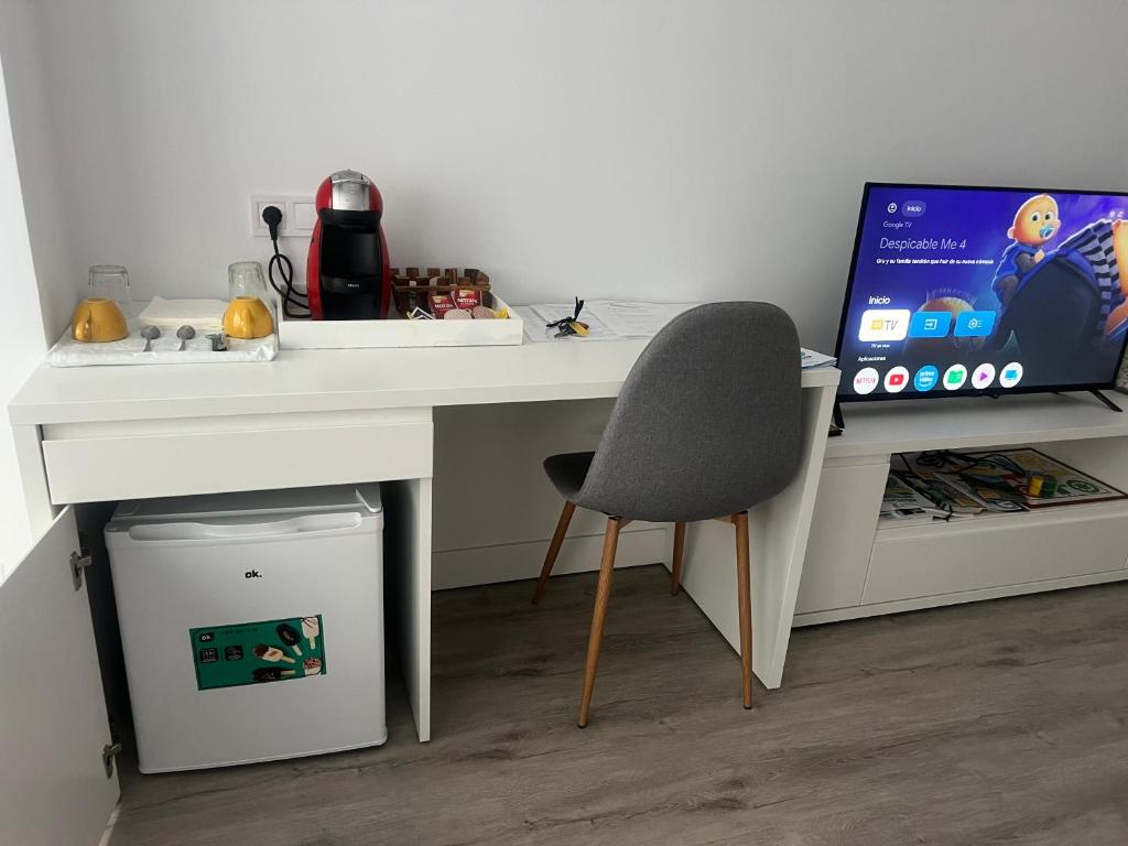 TV a/nebo společenská místnost v ubytování Suite Los Castros
