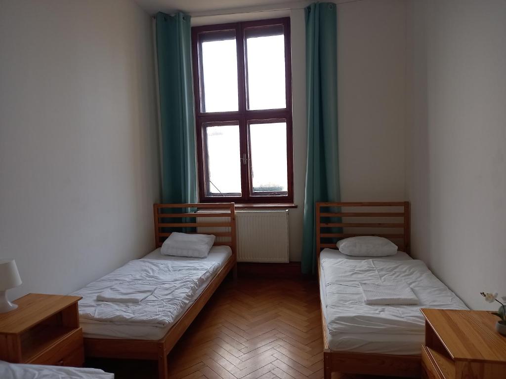 Postel nebo postele na pokoji v ubytování Penzion Kravín