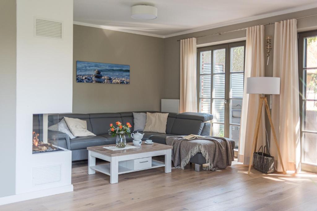 Posezení v ubytování Zur Heiderose Haus 8 Villa Pebble