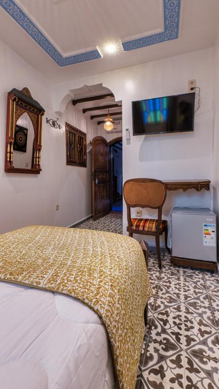 TV a/nebo společenská místnost v ubytování Casa Layan