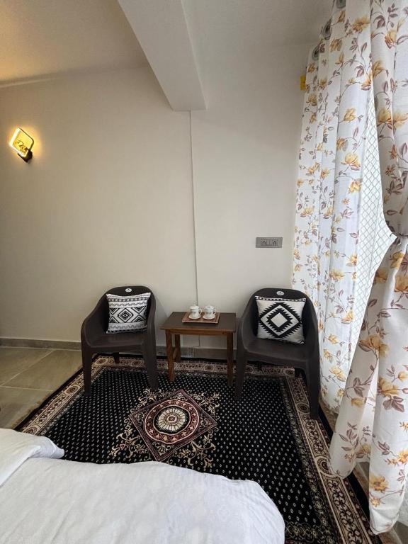 Postel nebo postele na pokoji v ubytování Arcane viewfinder homestay