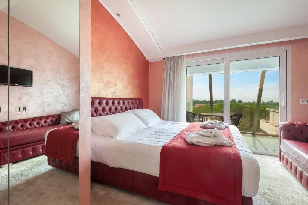 Postel nebo postele na pokoji v ubytování Hotel Ca' Di Valle