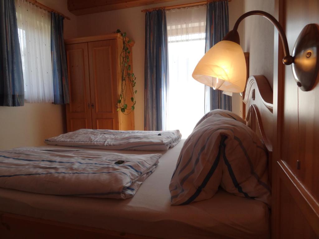 Posteľ alebo postele v izbe v ubytovaní Ferienhaus Zotter