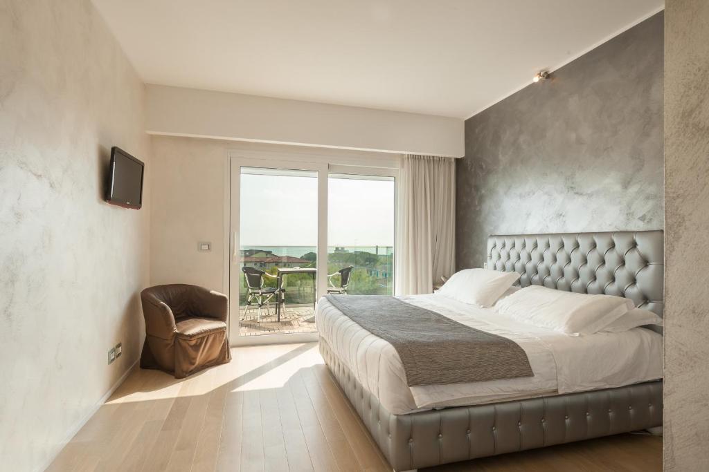 Postel nebo postele na pokoji v ubytování Hotel Ca' Di Valle