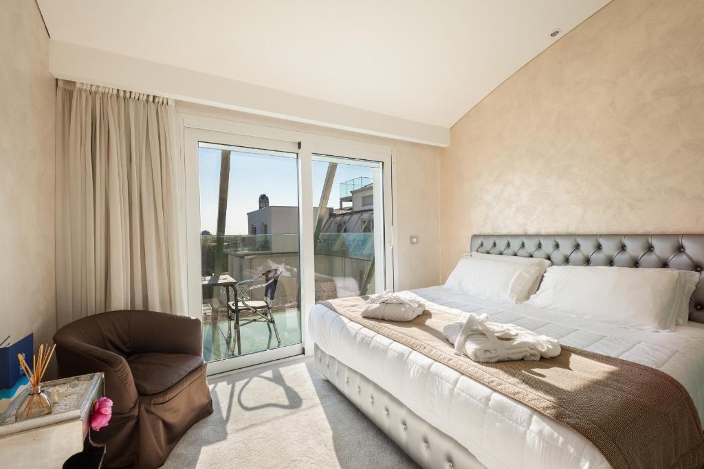 Postel nebo postele na pokoji v ubytování Hotel Ca' Di Valle
