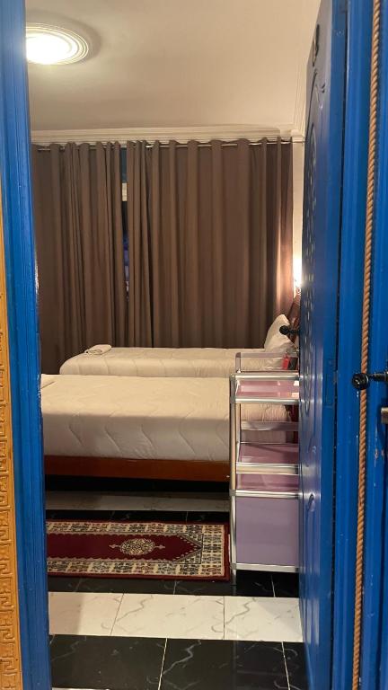 Postel nebo postele na pokoji v ubytování Hotel Riad Tetouan