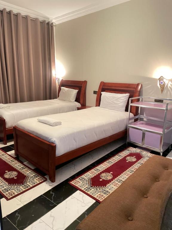 Letto o letti in una camera di Hotel Ryad Tetouan Aero
