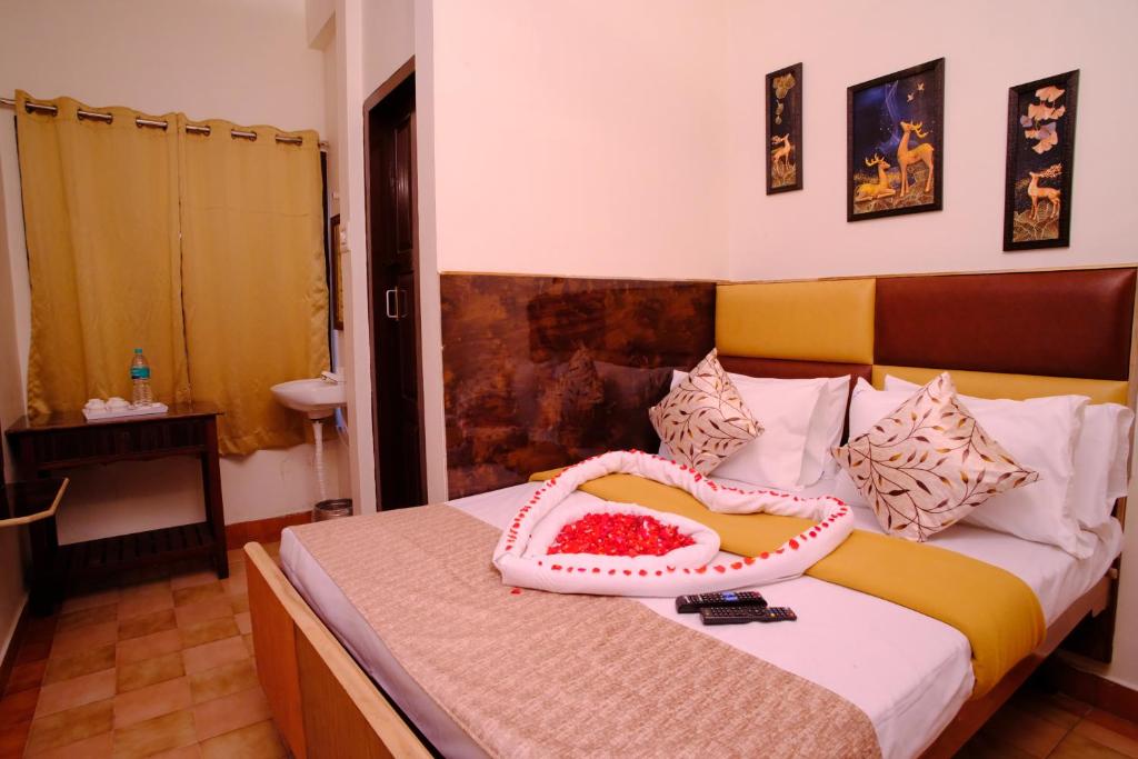 Postel nebo postele na pokoji v ubytování ANL Residency