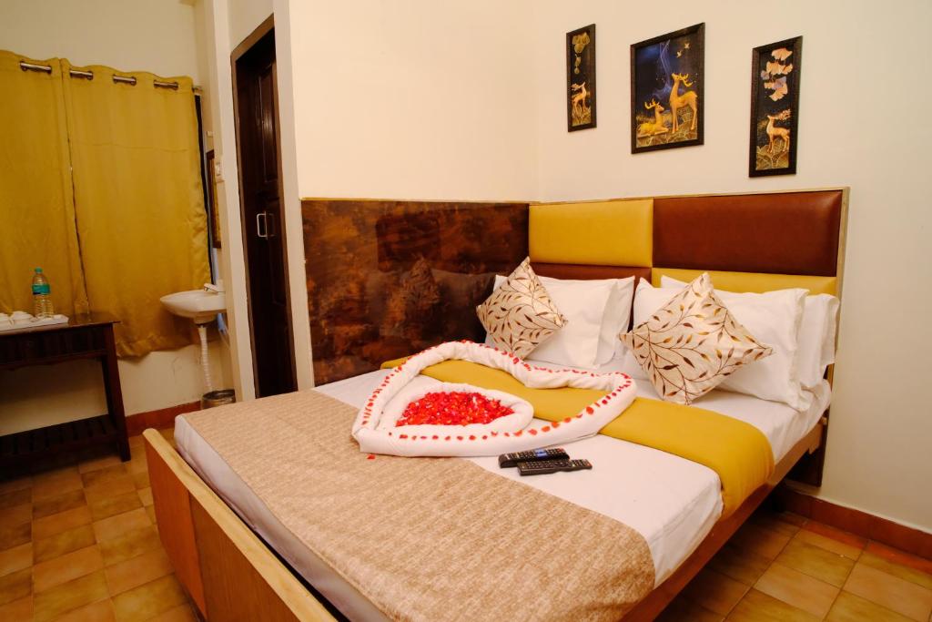 Postel nebo postele na pokoji v ubytování ANL Residency