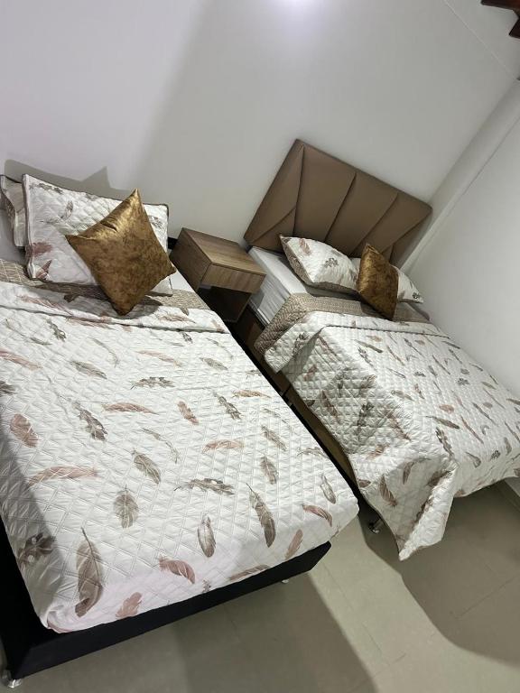 Postel nebo postele na pokoji v ubytování Hotel Lesus
