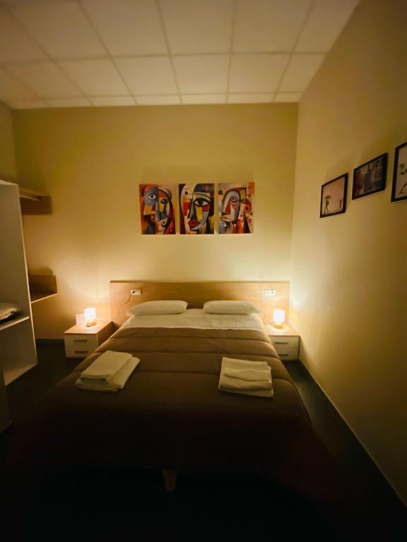 Postel nebo postele na pokoji v ubytování B&B l'angoletto